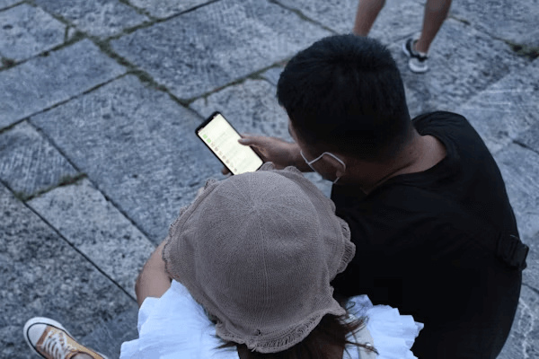 a boy playing phone